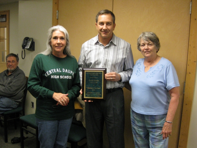 Dave Zeiters 80 came up from Florida to receive his 2012 Alumnus of the Year plaque at our June meeting.  Dave was accompanied by his parents, Jim (seated) and Claire Hann Zeiters 58. 