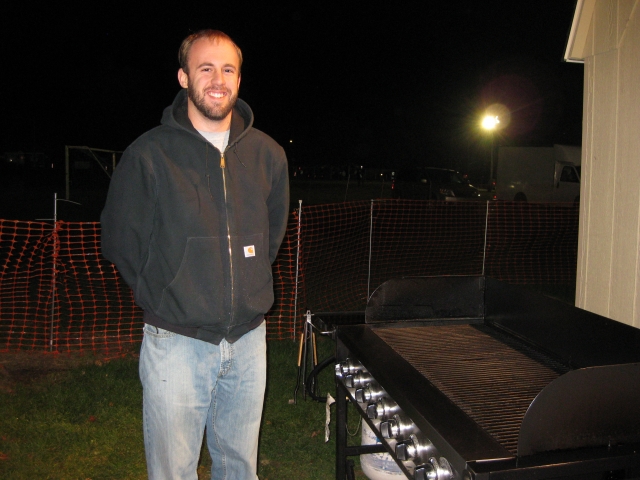Our expert grill master - Nick Evans 06.  Not pictured:  Assistant Griller, Sam Potteiger 58.  The pre-game grillers are Gary Wierman 76 and Gary Smitty Smith.